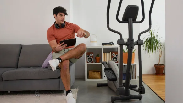 Full shot man holding tablet-How Much Weight You Can Lose in 3 Months