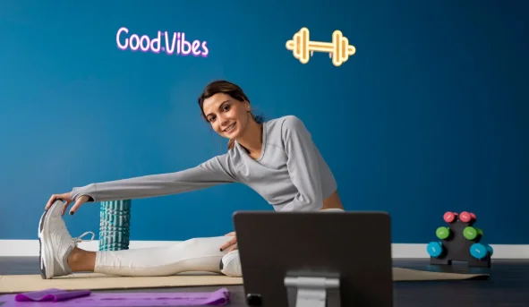Female fitness instructor using tablet to teach a class from home-trucofax