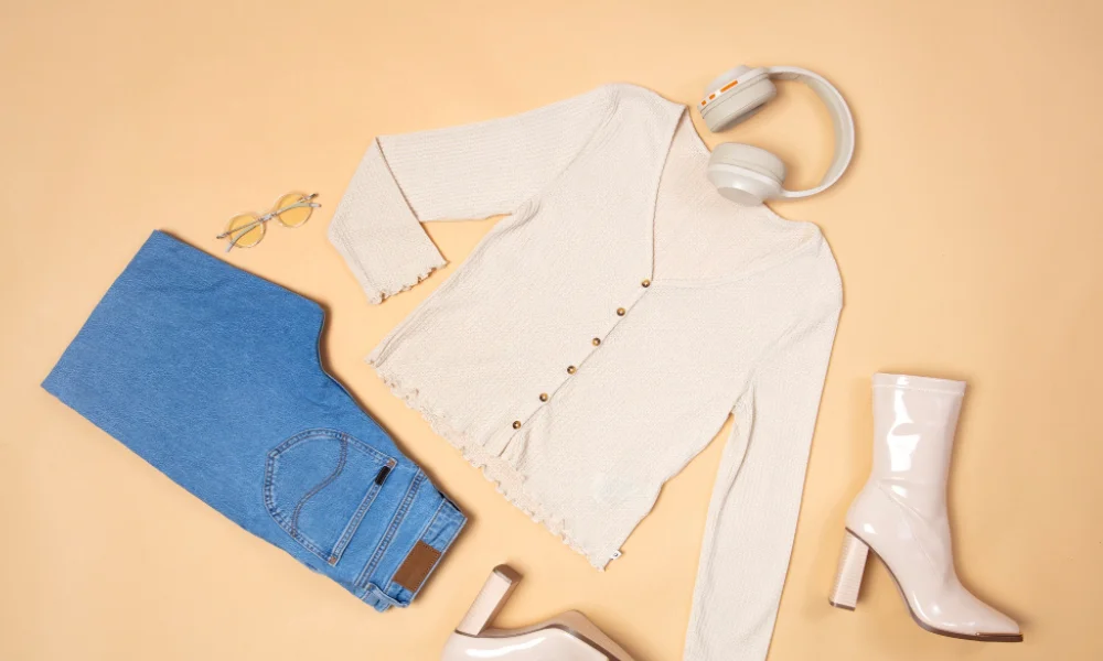 Flat lay of outfits with matching fall shoes.