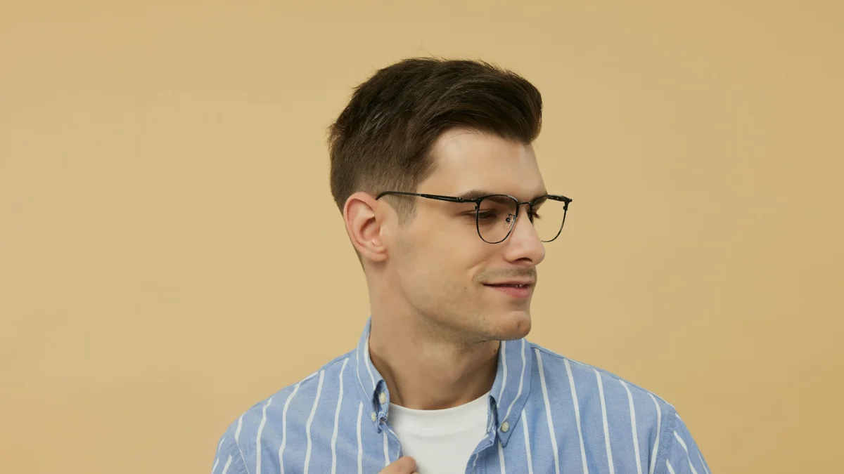 Hipster man in flannel shirt and vintage glasse