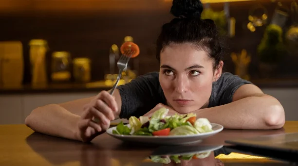 Woman trying to eat healthy at home-how long to lose 30 lbs