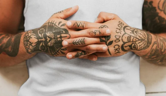 Symbolic Tattoo on Hands