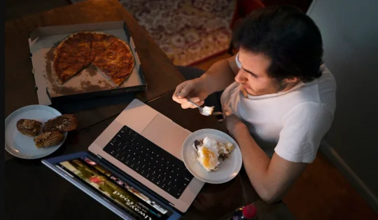 Top view man with snack and laptop-the meal is not over when i m full