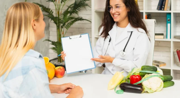 Medium shot doctor showing results to patient