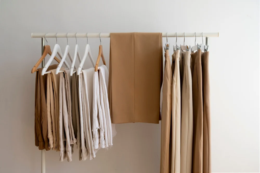 Clothing rack with trousers and shirts