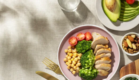 Top view of plate with keto diet food and nuts-eat this and live