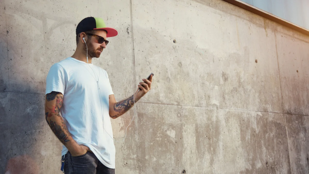Indie style man wearing vintage band shirt