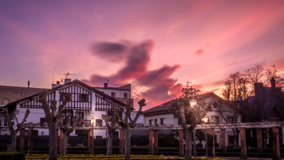 Luxury inn with traditional architecture at sunset sky