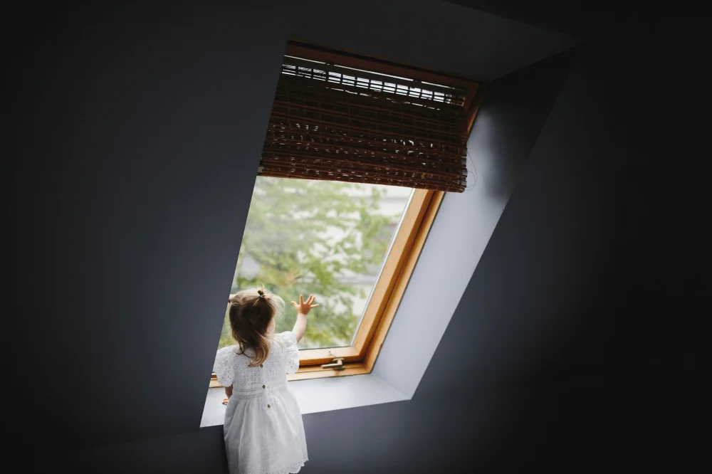 Natural light entering room through skylight