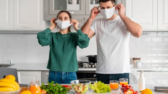 Young couple cooking at home-lifestyle factors definition
