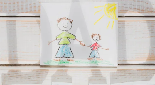 Dad writing shadow over picture