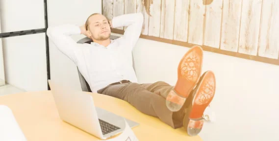 Businessman relaxing in office